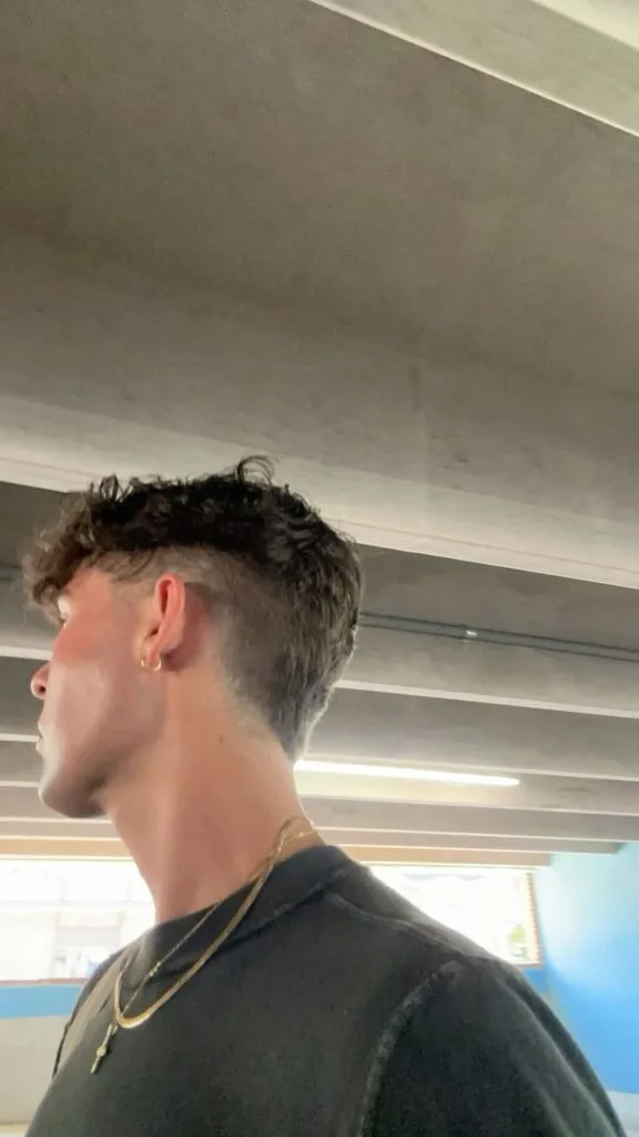 soft-mullet-low-fade-mens-curly-haircut